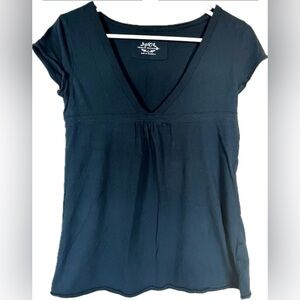 Black short sleeve shirt with deep v-neck design. Excellent condition! Size L